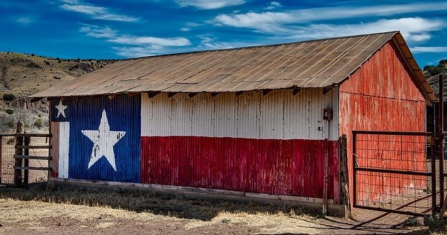 Barn with a painted Texas flag