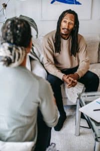 Patient Doctor Speaking in Psychiatrist Office