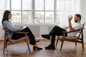 Patient and Doctor Talking in Outpatient Psychiatrist Office